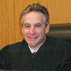 Administrative Judge Jeremy Weinstein