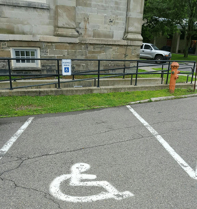 The photo is of the parking area that leads to a ramp.