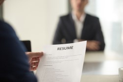 A resume exchanging hands