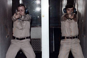 two trainees doing firearms training